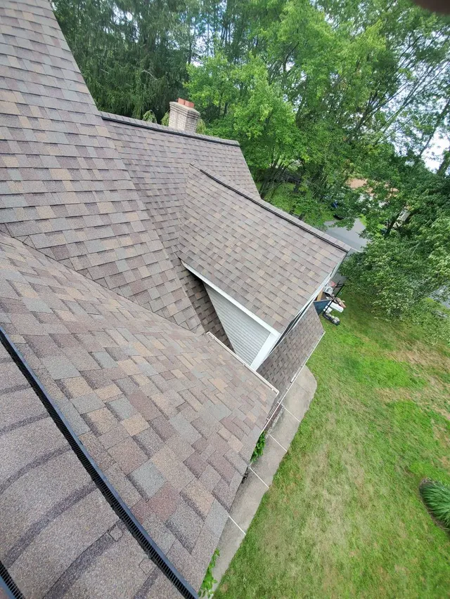Roofing team at work